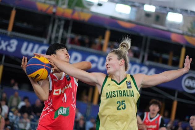 June 5, 2026, Warsaw, Masovian Voivodeship, Poland: Australia s AMY ATWELL (25) and China s WENXIA LI (21) in action during a FIBA 3x3 Basketball World Cup women s last 16 game between Australia and China in Warsaw, Poland. Warsaw Poland - ZUMAk204 20260605_zip_k204_012 Copyright: xRomanxKozielx