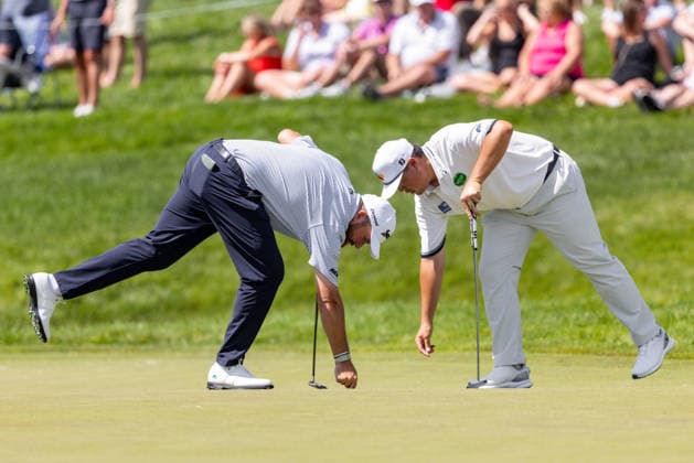 June 5, 2026, Dublin, Ohio, U.S: Shane Lowry (left) and Sungjae Im (right) repair ball marks on the 14th green during the second round of The Memorial Tournament at Muirfield Village Golf Club, Dublin, Ohio. Dublin U.S - ZUMAs304 20260605_zaf_s304_070 Copyright: xScottxStuartx