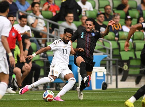 AUSTIN, TX - June 05: Saudi Arabia defender Khalid Alghannam (17) launches a pass as Puerto Rico player Nicolas Cardona (2) defends during International Friendly, Länderspiel, Nationalmannschaft between Saudi Arabia and Puerto Rico on June 5, 2026 at Q2 Stadium in Austin, TX. (Photo by John Rivera Icon Sportswire) SOCCER: JUNE 05 International Friendly Saudi Arabia vs. Puerto Rico EDITORIAL USE ONLY Icon426260605025