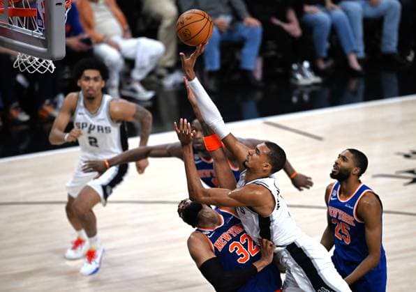 (260606) -- SAN ANTONIO, June 6, 2026 -- Victor Wembanyama (2nd R) of San Antonio Spurs shoots during the final game 2 between New York Knicks and San Antonio Spurs at the 2025-2026 NBA, Basketball Herren, USA basketball game in San Antonio, the United States, June 5, 2026. ) (SP)U.S.-SAN ANTONIO-BASKETBALL-NBA-FINALS-KNICKS VS SPURS WuxXiaoling 