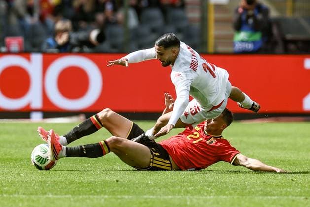 Tunisian Mohamed Belhadj Mahmoud and Belgium s Timothy Castagne fight for the ball during a friendly soccer game between Belgian national team, Nationalteam Red Devils and Tunisia, Saturday 06 June 2026 in Brussels, part of the preparations for the 2026 FIFA World Cup, WM, Weltmeisterschaft, Fussball BRUNOxFAHY  x176305289x
