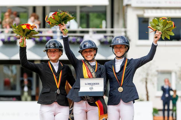 BALVE - LONGINES Balve Optimum 2026, BALVE - LONGINES Balve Optimum 2026 KLAPHAKE Laura (GER), ROTH Britt (GER), TEBBEL Justine (GER) Meisterehrung Springprüfung Kl.S*** mit 2 Umläufen (1.50 m) Finalwertung Deutsche Meisterschaften Springreiterinnen 2026 Preis der platzmann federn gmbh & co. kg Balve, Reitanlage Schloss Wocklum 06. June 2026 - *** BALVE LONGINES Balve Optimum 2026, BALVE LONGINES Balve Optimum 2026 KLAPHAKE Laura GER , ROTH Britt GER , TEBBEL Justine GER Championship Jumping Class S with 2 rounds 1 50 m Final German Championships Show Jumping Women 2026 Preis der platzmann federn gmbh co kg Balve, riding facility Schloss Wocklum 06 June 2026