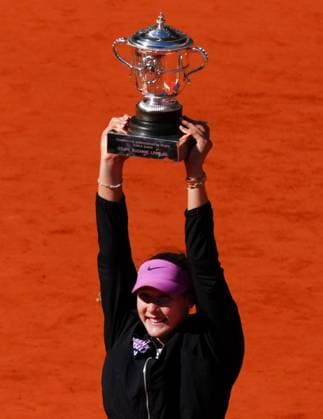 Mirra Andreeva celebrates with the trophy French Open Tennis, Day Fourteen, Tennis, Roland Garros, Paris, France - 06 Jun 2026Paris Roland Garros France EDITORIAL USE ONLY No use with unauthorised audio, video, data, fixture lists, club league logos or live services. Online in-match use limited to 120 images, no video emulation. No use in betting, games or single club league player publications.  Copyright: xJavierxGarcia Shutterstockx 16906570y