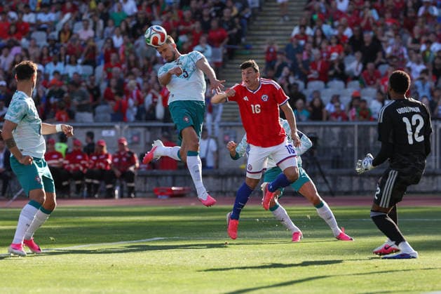 Ruben Dias Portugal , Gonzalo Tapia Chile in action, with the ball during the international friendly match between Portugal and Chile at Estadio Nacional do Jamor on June 6, 2026, in Oeiras, Portugal The match serves as preparation for the 2026 FIFA World Cup in the United States Copyright: JoaquimxFerreira