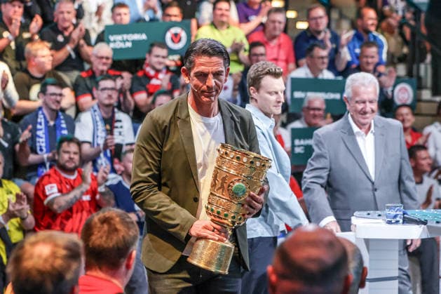 Sport, Football, DFB Cup Season 2026 2027 DFB Cup Draw for the 1st Round 06 06 2026, German Football Museum Deniz Aytekin Draw Fairy, Former Bundesliga referee carries the cup in Dortmund German Football Museum North Rhine-Westphalia Germany
