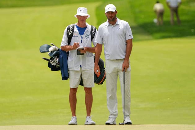 DUBLIN, OH - JUNE 06: Scottie Scheffler of the United States and his caddie Ted Scott look over the green on hole 2 during third round of the Memorial Tournament on June 06, 2026 at the Muirfield Village Golf Club in Dublin, Ohio. (Photo by Jason Mowry Icon Sportswire) GOLF: JUN 06 PGA, Golf Herren the Memorial Tournament presented by Workday EDITORIAL USE ONLY Icon260606027