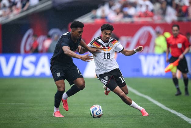 Soccer World Cup 2026 test match in Chicago 06 06 2026 USA Germany Nathaniel Brown right, Germany against Alex Freeman left, USA