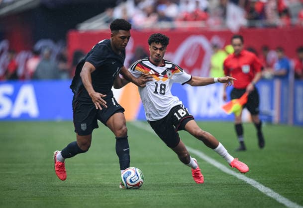 Soccer World Cup 2026 test match in Chicago 06 06 2026 USA Germany Nathaniel Brown right, Germany against Alex Freeman left, USA
