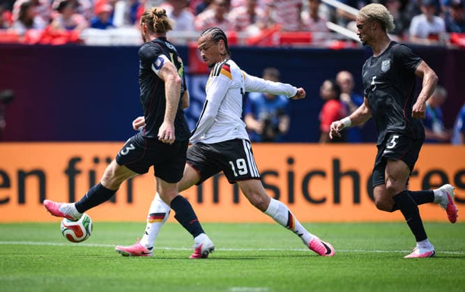 Soccer World Cup 2026 test match in Chicago 06 06 2026 USA Germany Leroy Sane center, Germany against Tim Ream left, USA and Antonee Robinson right, USA