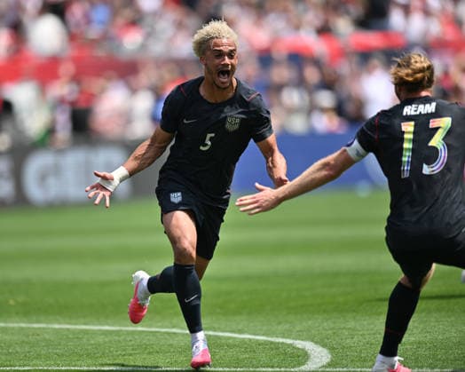 CHICAGO, IL - JUNE 06: United States left back Antonee Robinson (5) celebrates his goal during a friendly match between the United States and Germany on June 6, 2026, at Soldier Field in Chicago, IL. (Photo by Patrick Gorski Icon Sportswire) SOCCER: JUN 06 USA vs Germany EDITORIAL USE ONLY Icon260606008