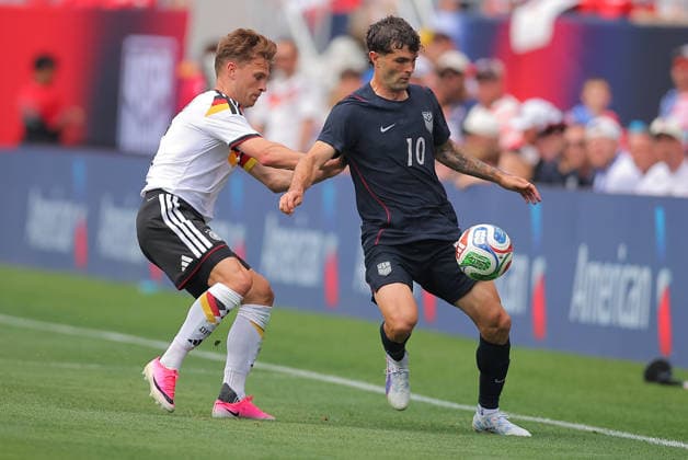 CHICAGO, IL - JUNE 06: Christian Pulisic 10 of the United States controls the ball against Joshua Kimmich 6 of Germany during a friendly match on June 6, 2026 at Soldier Field in Chicago, Illinois. (Photo by Melissa Tamez Icon Sportswire) SOCCER: JUN 06 USA vs Germany EDITORIAL USE ONLY Icon260606023