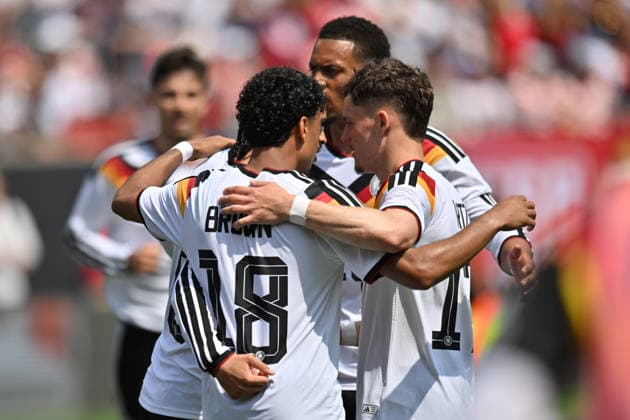 CHICAGO, IL - JUNE 06: Germany right wing Leroy SanÃ (19) celebrates with his teammates after scoring a goal during a friendly match between the United States and Germany on June 6, 2026, at Soldier Field in Chicago, IL. (Photo by Patrick Gorski Icon Sportswire) SOCCER: JUN 06 USA vs Germany EDITORIAL USE ONLY Icon260606027