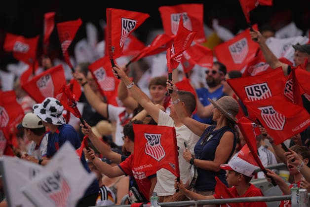 CHICAGO, IL - JUNE 06: United States fans wave flags before the start of a friendly match between Germany and the United States on June 6, 2026 at Soldier Field in Chicago, Illinois. (Photo by Melissa Tamez Icon Sportswire) SOCCER: JUN 06 USA vs Germany EDITORIAL USE ONLY Icon260606025