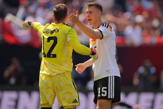 CHICAGO, IL - JUNE 06: Oliver Baumann 12 of Germany and Nico Schlotterbeck 15 of Germany during a friendly match between the United States on June 6, 2026 at Soldier Field in Chicago, Illinois. (Photo by Melissa Tamez Icon Sportswire) SOCCER: JUN 06 USA vs Germany EDITORIAL USE ONLY Icon260606084