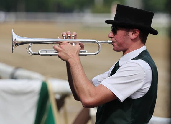The trumpeter plays Call to the Post leading up to the Belmont Stakes in Saratoga Springs, NY, on Belmont day here. June 6, 2026, photo by Mark Abraham UPI  SAR20260606103 MARKxABRAHAM