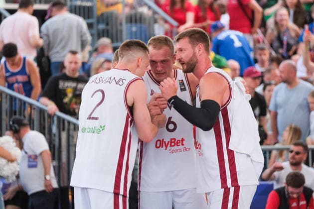 June 6, 2026, Warsaw, Masovian Voivodeship, Poland: Latvia s FRANCIS LACIS (6), NAURIS MIEZIS (1), KARLIS LASMANIS (2), and ZIGMARS RAIMO (9) celebrate victory at the end of a FIBA 3x3 Basketball World Cup men s quarter-final game between Latvia and Lithuania in Warsaw, Poland. Warsaw Poland - ZUMAk204 20260606_zip_k204_061 Copyright: xRomanxKozielx