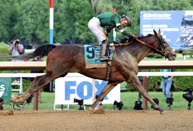 Golden Tempo, ridden by Jose Ortiz, celebrates as he wins the 2026 Belmont Stakes at Saratoga Race Course in Saratoga Springs, NY on June 6, 2026,  SAR20260606104 MARKxABRAHAM