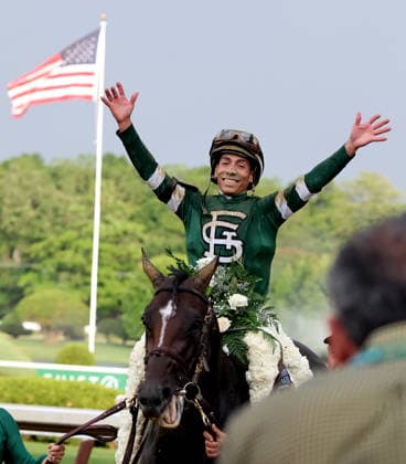 Jose Ortiz, aboard Golden Tempo, celebrates after winning the 2026 Belmont Stakes at Saratoga Race Course in Saratoga Springs, NY on June 6, 2026,  SAR20260606106 MARKxABRAHAM