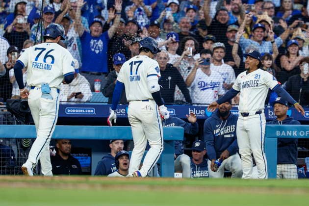 MLB, Baseball Herren, USA - Los Angeles Dodgers vs Anaheim Angels Dodgers designated hitter Shohei Ohtani (C) celebrates with infielder Santiago Espinal after hitting a home run during the first inning of an MLB game between the Los Angeles Dodgers and the Anaheim Angels at Uniqlo Field in Dodger Stadium in Los Angeles, California, USA, 06 June 2026. LOS ANGELES CALIFORNIA UNITED STATES  Copyright: xCHRISxTORRESx