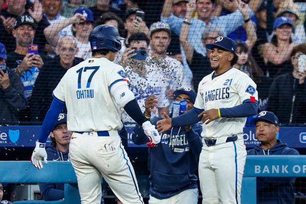 MLB, Baseball Herren, USA - Los Angeles Dodgers vs Anaheim Angels Dodgers designated hitter Shohei Ohtani (L) celebrates with infielder Santiago Espinal after hitting a home run during the first inning of an MLB game between the Los Angeles Dodgers and the Anaheim Angels at Uniqlo Field in Dodger Stadium in Los Angeles, California, USA, 06 June 2026. LOS ANGELES CALIFORNIA UNITED STATES  Copyright: xCHRISxTORRESx