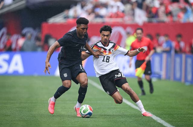 Soccer World Cup 2026 test match in Chicago 06 06 2026 USA Germany Nathaniel Brown right, Germany against Alex Freeman left, USA