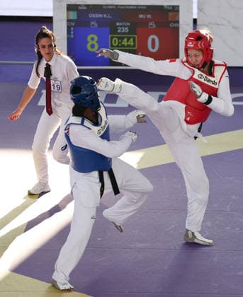 (260607) -- ROME, June 7, 2026 -- Mu Wenzhe (R) of China competes with Kimi Laurene Ossin (front L) of Cote d Ivoire during their women s +67kg final match at Roma 2026 World Taekwondo Grand Prix in Rome, Italy, June 6, 2026. ) (SP)ITALY-ROME-TAEKWONDO-ROMA 2026 GRAND PRIX-WOMEN S +67KG LixJing 