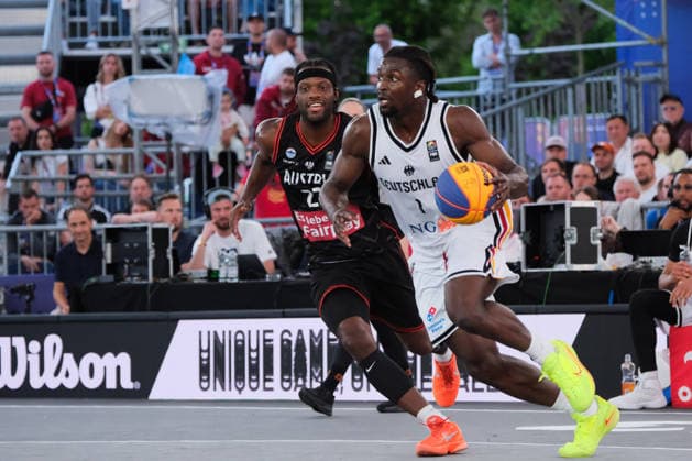 June 6, 2026, Warsaw, Masovian Voivodeship, Poland: Germany s DENZEL AGYEMAN (1) and Austria s QUINCY DIGGS (22) in action during a FIBA 3x3 Basketball World Cup men s quarter-final game between Germany and Austria in Warsaw, Poland. Basketball 2026: FIBA 3x3 World Cup Men s Quarterfinal: Germany 21:19 Austria  - ZUMAk204 20260606_zip_k204_112 Copyright: xRomanxKozielx