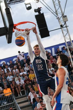 June 6, 2026, Warsaw, Masovian Voivodeship, Poland: USA s HENRY CARUSO (12) slam dunks during a FIBA 3x3 Basketball World Cup men s quarter-final game between France and USA in Warsaw, Poland. Basketball 2026: FIBA 3x3 World Cup Men s Quarterfinal: France 14:11 United States  - ZUMAk204 20260606_zip_k204_127 Copyright: xRomanxKozielx