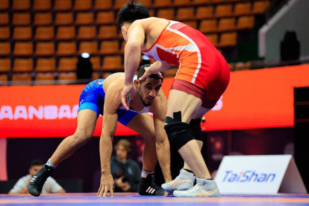 Wrestling Ranking Series Ulaanbaatar Open 65kg FS Rahman Mousa Amouzadkhalili IRI df Kwang Jin Kim PRK Copyright: xKostadinxAndonovx xUnitedxWorldxWrestlingx Kostadin Andonov United World Wrestling