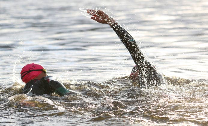 Ironman in Hamburg 2026 Visually impaired Rob Sears r with his guide Ant Munson l at the swim start in the Binnenalster lake