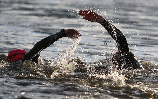 Ironman in Hamburg 2026 Visually impaired Rob Sears r with his guide Ant Munson l at the swim start in the Inner Alster lake