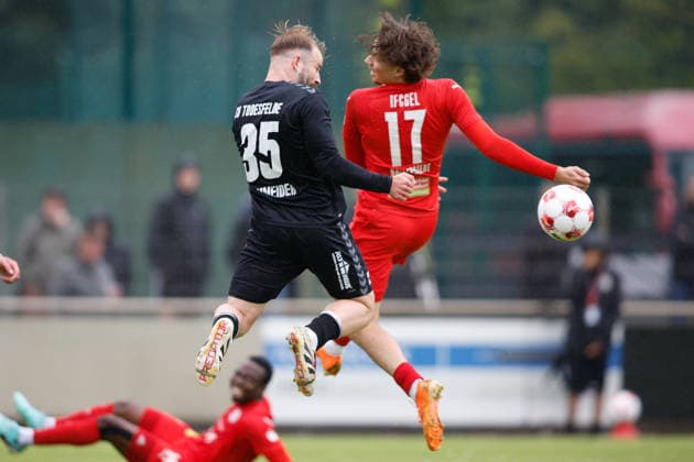 Soccer I Men I Promotion round I Regionalliga Nord I 1 FC Germania Egestorf Langreder SV Todesfelde I 07 06 2026 Jan Marc Schneider 35, SV Todesfelde and Pino Ballerstedt 17, 1 FC Germania Egestorf Langreder in a header duel Bremen pitch BRZ Arena Bremen Germany Copyright: xLobeca CedricxSiefkerx