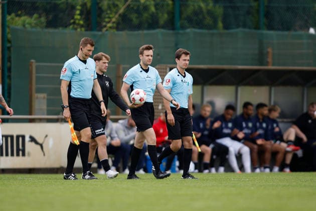 Soccer I Men I Promotion round I Regionalliga Nord I 1 FC Germania Egestorf Langreder SV Todesfelde I 07 06 2026 Tom Holsten Referee runs in with his assistants Bremen Pitch BRZ Arena Bremen Germany Copyright: xLobeca CedricxSiefkerx