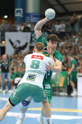 Handball DAIKIN HBL, SC DHfK Leipzig GWD Minden 07 06 2026 Matej Klima 13, SC DHfK Leipzig is attacked by Karolis Antanavicius 8, GWD Minden Handball, DAIKIN HBL, 1 Bundesliga, Season 2025 2026, Matchday 34 SC DHfK Leipzig vs GWD Minden on 07 06 2026 at Quarterback Immobilien Arena Leipzig Copyright: xBEAUTIFULxSPORTS JanxKaeferx