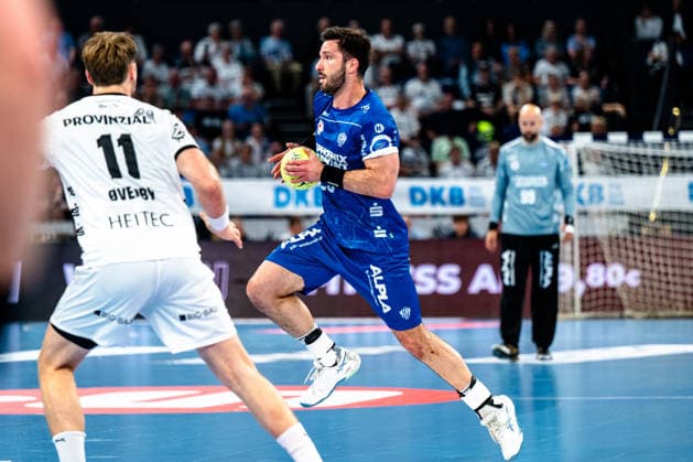 07 06 2026, xdobgx, Handball Daikin HBL, THW Kiel TBV Lemgo Lippe v l Petter Overby Kiel, 11 , Tim Suton TBV Lemgo Lippe, 23 on the ball, plays the ball