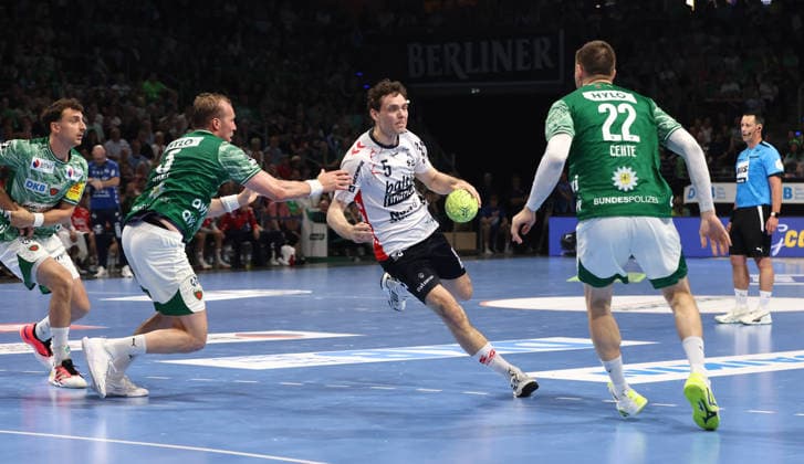 Max Darj, Niclas Kirkeloekke on the ball, Nejc Cehte duel Game scene Action Sport Handball HBL Bundesliga Men 34 Matchday Season 2025 2026 07 06 2026 Füchse Berlin vs SG Flensburg Handewitt