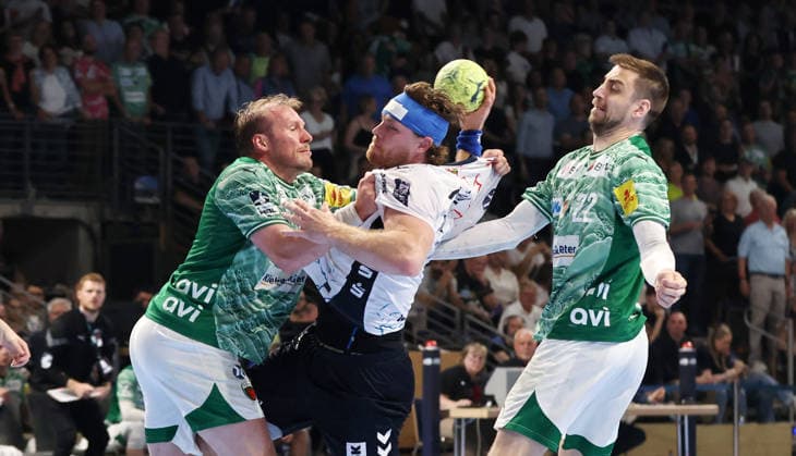 Max Darj, Johannes Golla on the ball, Nejc Cehte duel Match scene Action Sport Handball HBL Bundesliga Men 34 Matchday Season 2025 2026 07 06 2026 Füchse Berlin vs SG Flensburg Handewitt