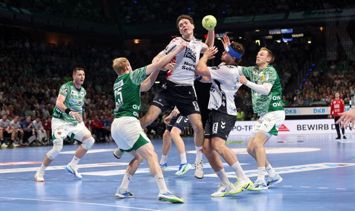 Matthes Langhoff, Niclas Kirkeloekke on the ball, Johannes Golla, Mathias Gidsel duel Match scene Action Sport Handball HBL Bundesliga Men 34 Matchday Season 2025 2026 07 06 2026 Füchse Berlin vs SG Flensburg Handewitt
