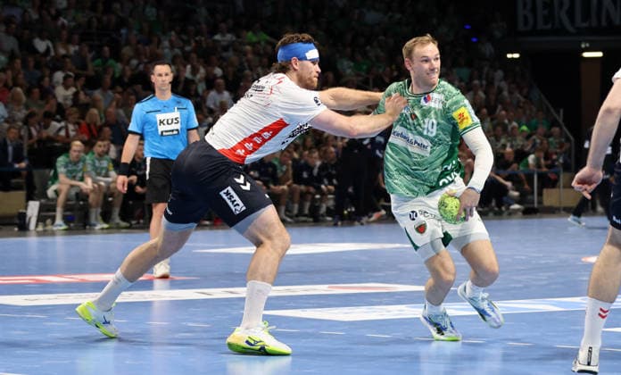 Johannes Golla, Mathias Gidsel on the ball duel Match scene Action Sport Handball HBL Bundesliga Men 34 Matchday Season 2025 2026 07 06 2026 Füchse Berlin vs SG Flensburg Handewitt