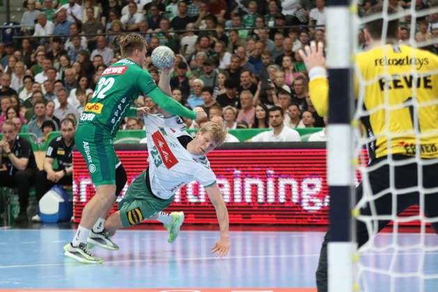 Handball DAIKIN HBL, SC DHfK Leipzig GWD Minden 07 06 2026 Franz Semper 32, SC DHfK Leipzig stops Niclas Benedict Heitkamp 23, GWD Minden Handball, DAIKIN HBL, 1 Bundesliga, Season 2025 2026, 34 Matchday SC DHfK Leipzig vs GWD Minden on 07 06 2026 at Quarterback Immobilien Arena Leipzig Copyright: xBEAUTIFULxSPORTS JanxKaeferx
