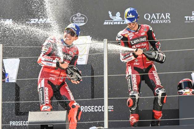 MOTO - MOTO GP - HUNGARY GRAND PRIX 2026 MARQUEZ Marc (spa), Ducati Lenovo Team, Ducati Desmosedici GP26, portrait celebrates his victory on podium with BAGNAIA Francesco (ita), Ducati Lenovo Team, Ducati Desmosedici GP26, portrait during the 2026 MotoGP Grand Prix of Hungary , on Balaton Park circuit, from June 5 to 7, in Hungary - Balaton ParkHungary  Copyright: xGIGIxSOLDANOx