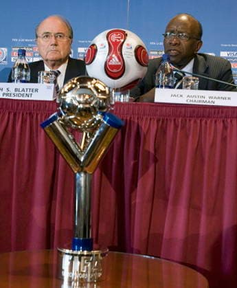 July 20, 2007, Toronto, On, Canada: Joseph Blatter, left, president of FIFA, listens to Jack Warner, chairman of the tournament, respond to a question during a news conference as part of the FIFA U-20 World Cup on July 20, 2007 in Toronto. In the foreground is the winner s trophy for the competition. (CP PHOTO ) Blatter Warner  - ZUMAc35_ 20070720_zaf_c35_001 Copyright: xPaulxChiassonx