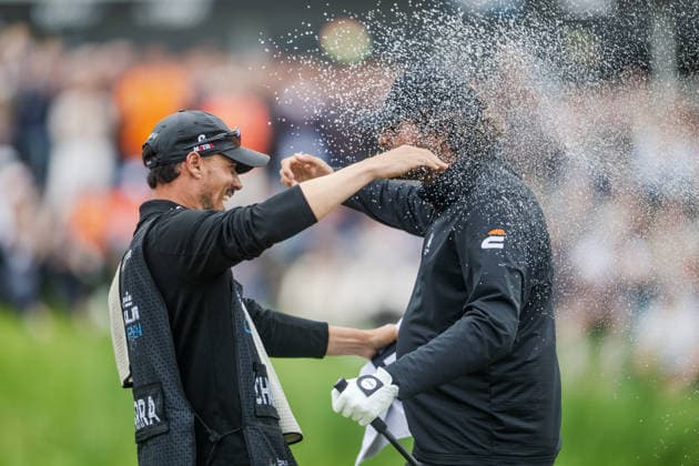 AMSTERDAM, NETHERLANDS - JUNE 07: Eugenio Chacarra of Spain celebrates with his Caddy Gonzalo Vicentrra after sinking his winning putt on the 18th green during the final round of the KLM Open at The International on June 7, 2026 in Amsterdam, Netherlands. Credit: Andy Astfalck NurPhoto Netherlands Copyright: xAndyxAstfalckx