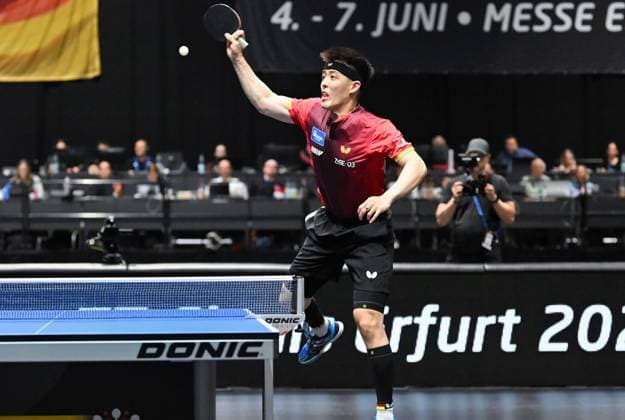 Dang Qiu from Borussia Düsseldorf wins the German Singles Championships for the third time after 2022 and 2023 Dang Qiu from Borussia Düsseldorf wins the German Singles Championships for the third time after 2022 and 2023 by beating Patrick Franziska 1 FC Saarbrücken TT Final Day of the German Womens and Mens Championships on June 7, 2026 at Messe Erfurt as part of the 3 German Table Tennis Finals in Erfurt Erfurt Messe Erfurt Thuringia Germany