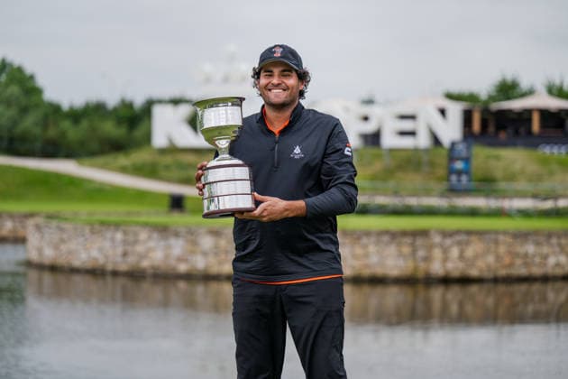 KLM Open 2026 - Day Four Eugenio Chacarra of Spain holds the tournament winner s trophy on the 18th green after winning during the final round of the KLM Open at The International in Amsterdam, Netherlands, on June 7, 2026. Amsterdam Netherlands  Copyright: xAndyxAstfalckx originalFilename:astfalck-klmopenr260607_npyEe.jpg