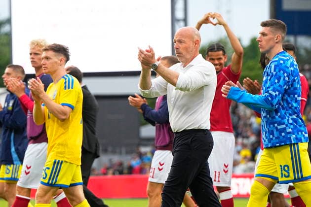 DENMARK National Team Test Match Denmark Ukraine Denmark s national coach Brian Riemer surrounded by players The football match between Denmark and Ukraine at Odense Stadium on Sunday, June 7, 2026 Christian Eriksen was able to leave the field on his own after collapsing on the grass in the second half of Denmark s test match against Ukraine The Danish player had received treatment but was able to walk to the ambulance that had driven onto the stadium Shortly after, the referee ended the match early Photo Bo Amstrup Scanpix 2026 , Odense Denmark  Copyright: BoxAmstrupx spdk20260607-201431-L