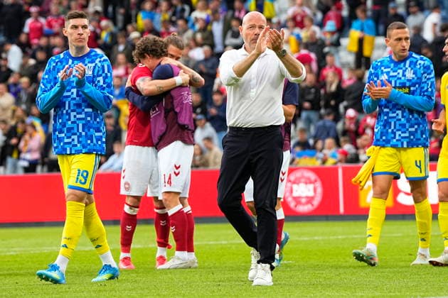 DENMARK National Team Test Match Denmark Ukraine Denmark s national coach Brian Riemer surrounded by players The football match between Denmark and Ukraine at Odense Stadium on Sunday, June 7, 2026 Christian Eriksen was able to leave the field on his own after collapsing on the grass in the second half of Denmark s test match against Ukraine The Danish player had received treatment but was able to walk to the ambulance that had driven onto the stadium Shortly after, the referee ended the match early Photo Bo Amstrup Scanpix 2026 , Odense Denmark  Copyright: BoxAmstrupx spdk20260607-201536-L