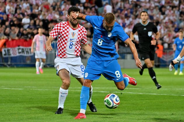 VARAZDIN, CROATIA - JUNE 07: Sandi Lovric of Slovenia (R) in action against Mateo Kovacic of Croatia (L) during the International men’s football Friendly match between Croatia and Slovenia at Stadium Varteks, Varazdin on June 07, 2026 in Varazdin, Croatia. (Photo by Igor Kupljenik Sports Press Photo).  Copyright: xIgorxKupljenikx xSPPx Sportspressphoto_SPR163051