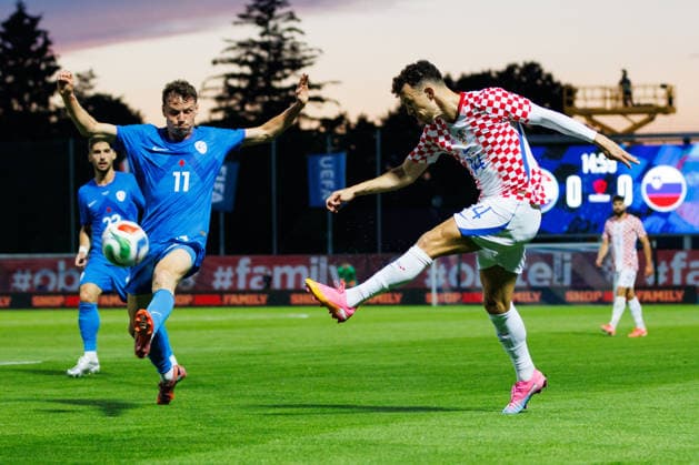 Pre World cup international friendly 2026 match between Croatia and Slovenia Ivan Perisic Croatia 14 and Tjas Begic Slovenia 11 seen in action during Pre World cup international friendly 2026 football match between Croatia and Slovenia, Stadium Varteks, Varazdin, Croatia 07 06 2026 Copyright: xBEAUTIFULxSPORTS Bosnjakovicx