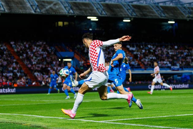 Pre World cup international friendly 2026 match between Croatia and Slovenia Ivan Perisic Croatia 14 and Srdan Kuzmic Slovenia 5 seen in action during Pre World cup international friendly 2026 football match between Croatia and Slovenia, Stadium Varteks, Varazdin, Croatia 07 06 2026 Copyright: xBEAUTIFULxSPORTS Bosnjakovicx